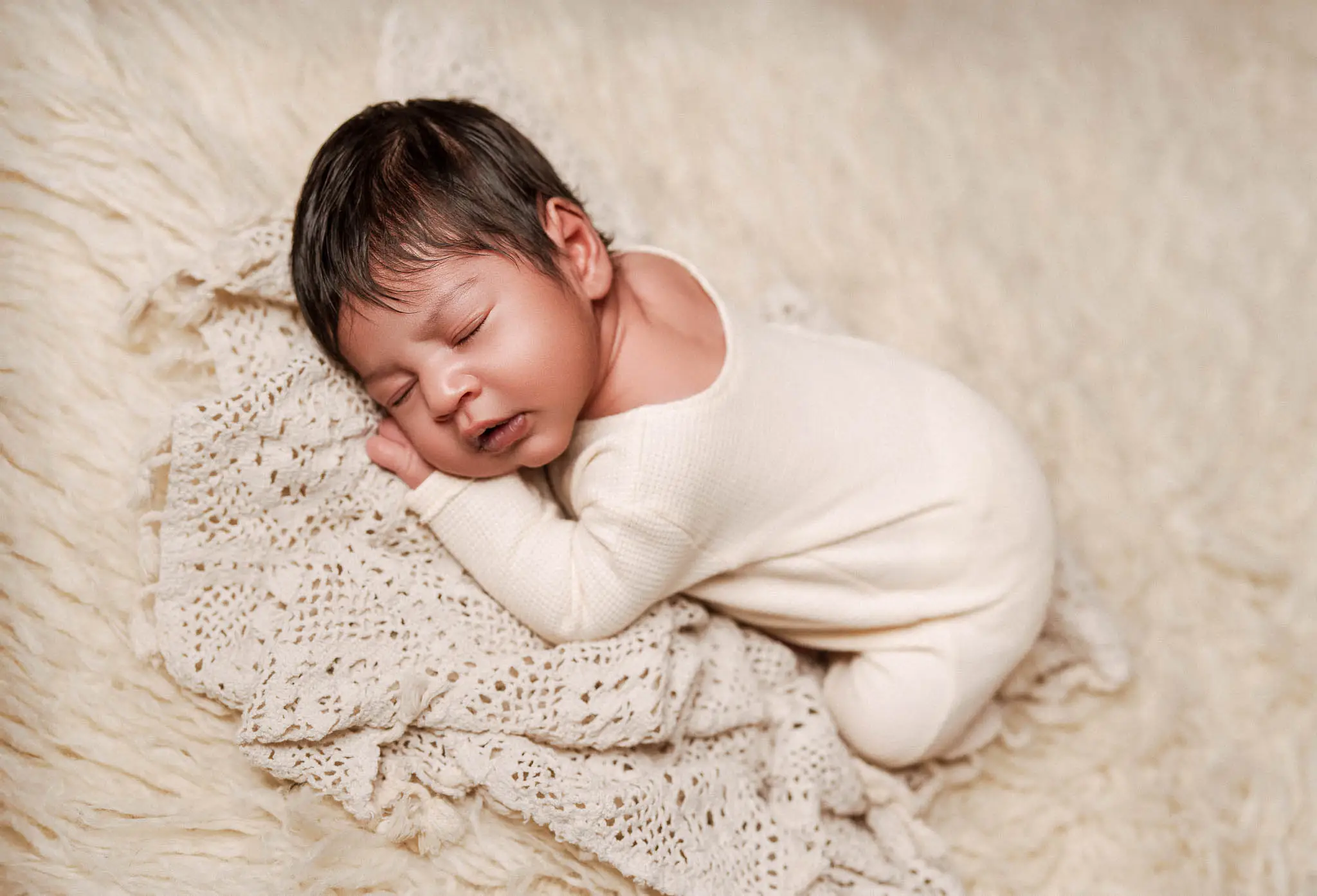 Newborn baby photographed at home