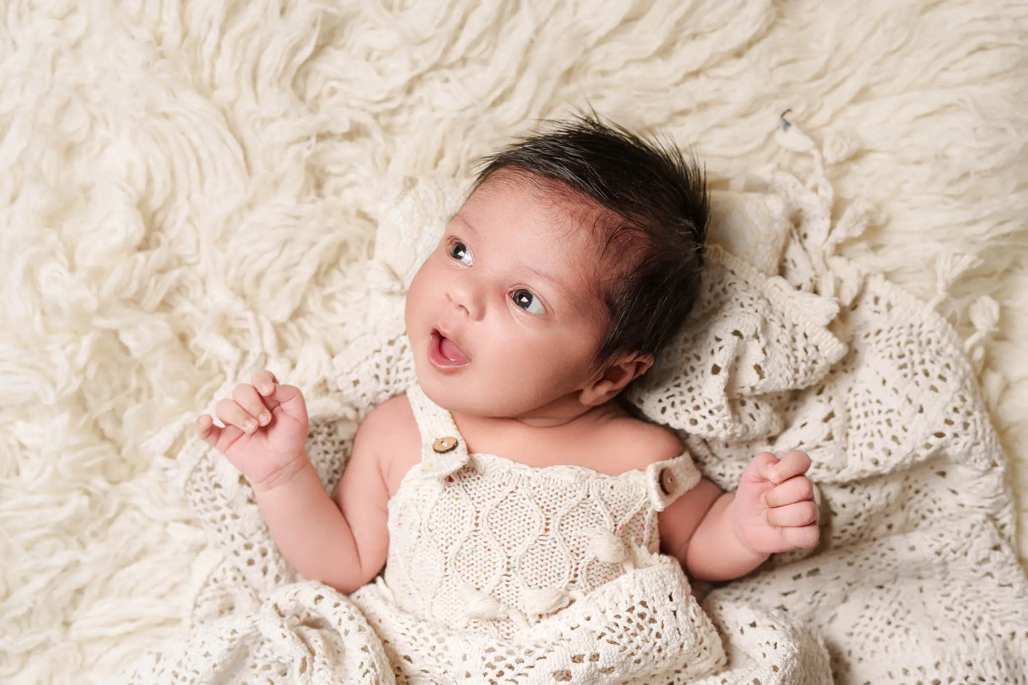 Tiny newborn details captured in warm light